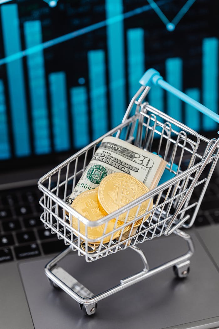 The Art of Drawing Readers In: Your attractive post title goes here Shopping cart with US dollars and bitcoins on laptop, symbolizing online finance and investment.