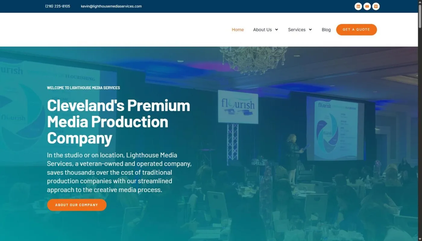 The Lighthouse Media Services homepage with a teal-tinted photo of a ballroom conference and a presenter on stage