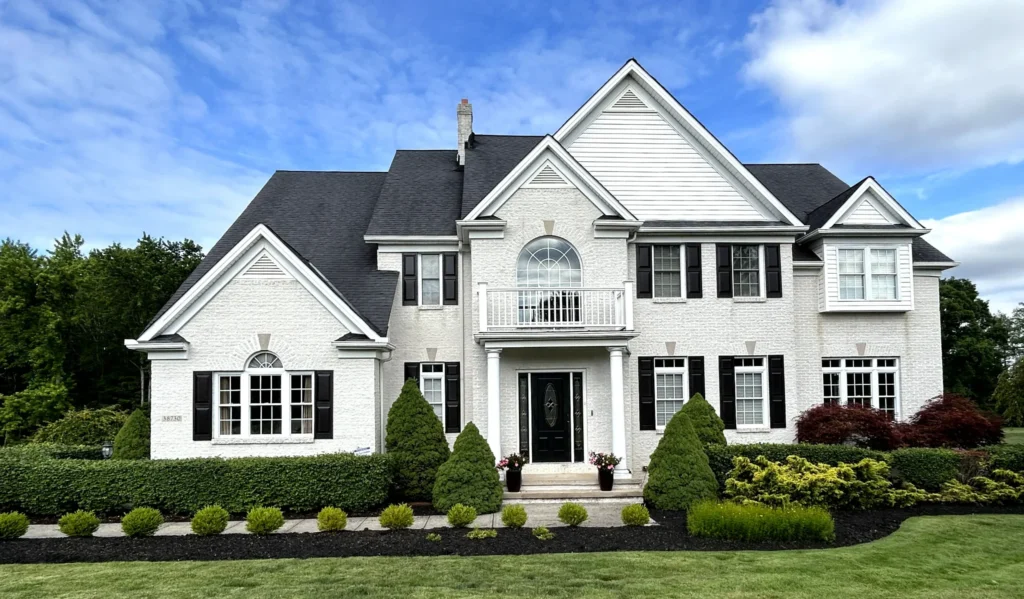 Two-story home exterior repainted by Four Seasons Paint Co. in Lake County, Ohio