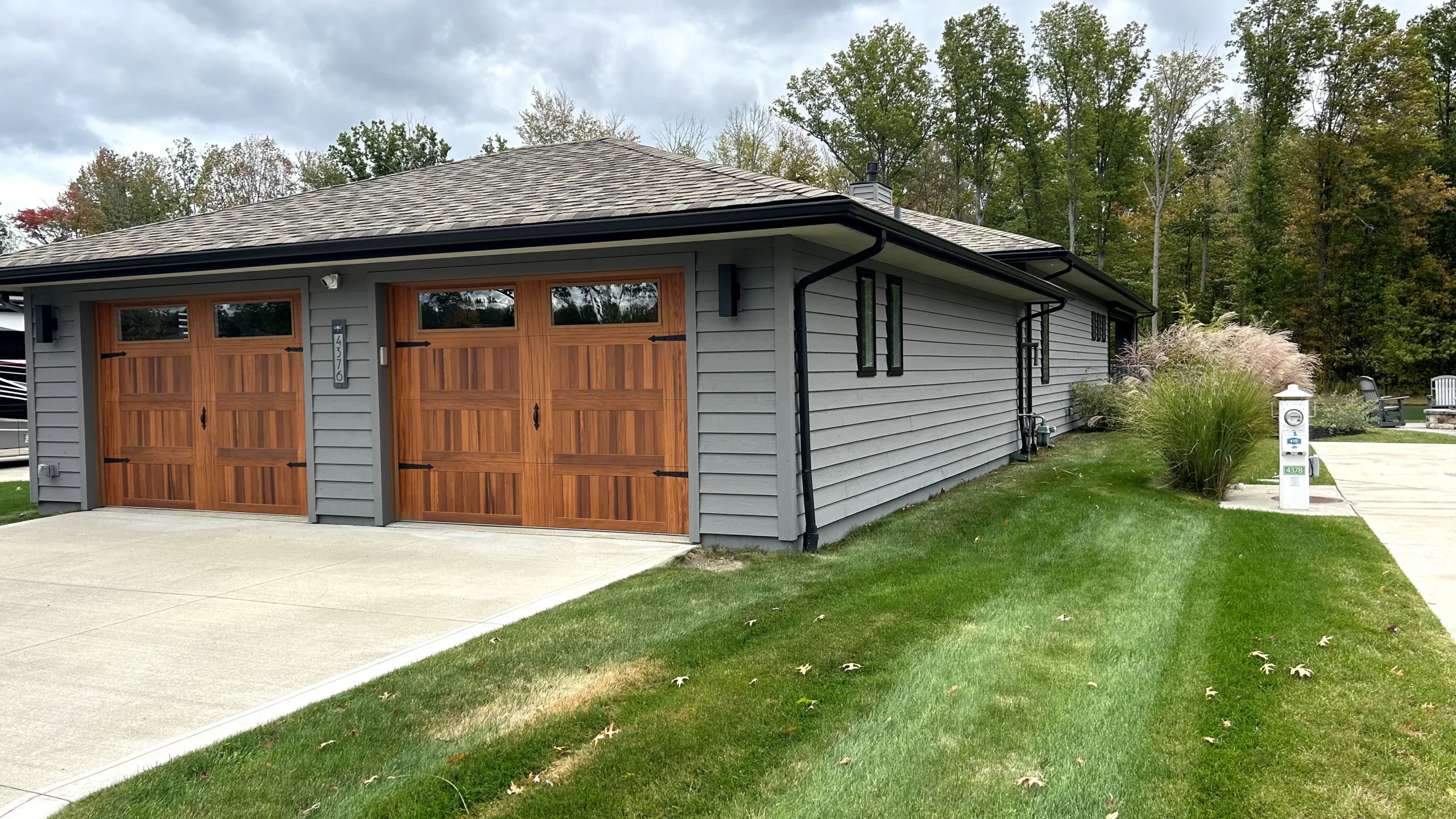 Garage doors and trim refinished by the Four Seasons crew