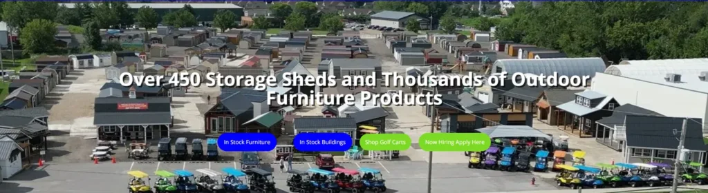 Aerial photo of the Hartville Outdoor Products sales lot packed with sheds, barns and golf carts